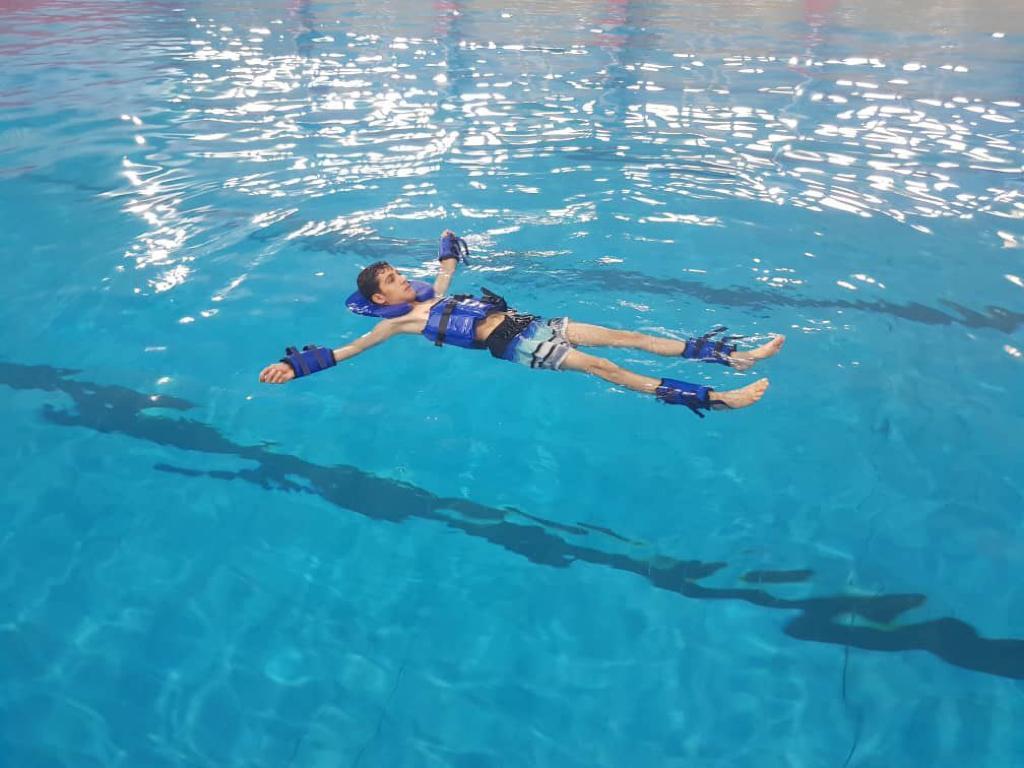 Complete set of floating in the water and running in the deep part of the pool