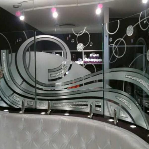 Patterned sandblasted glass